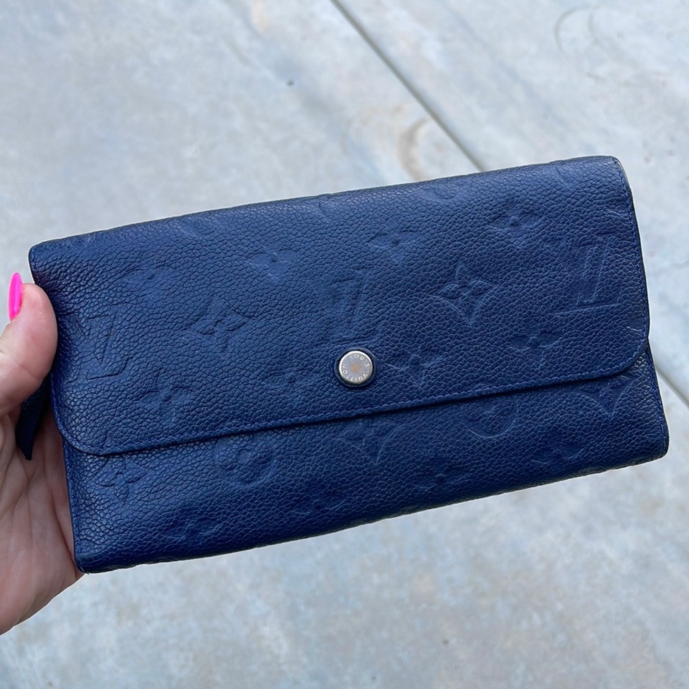 Used trifold navy blue Louis Vuitton wallet
